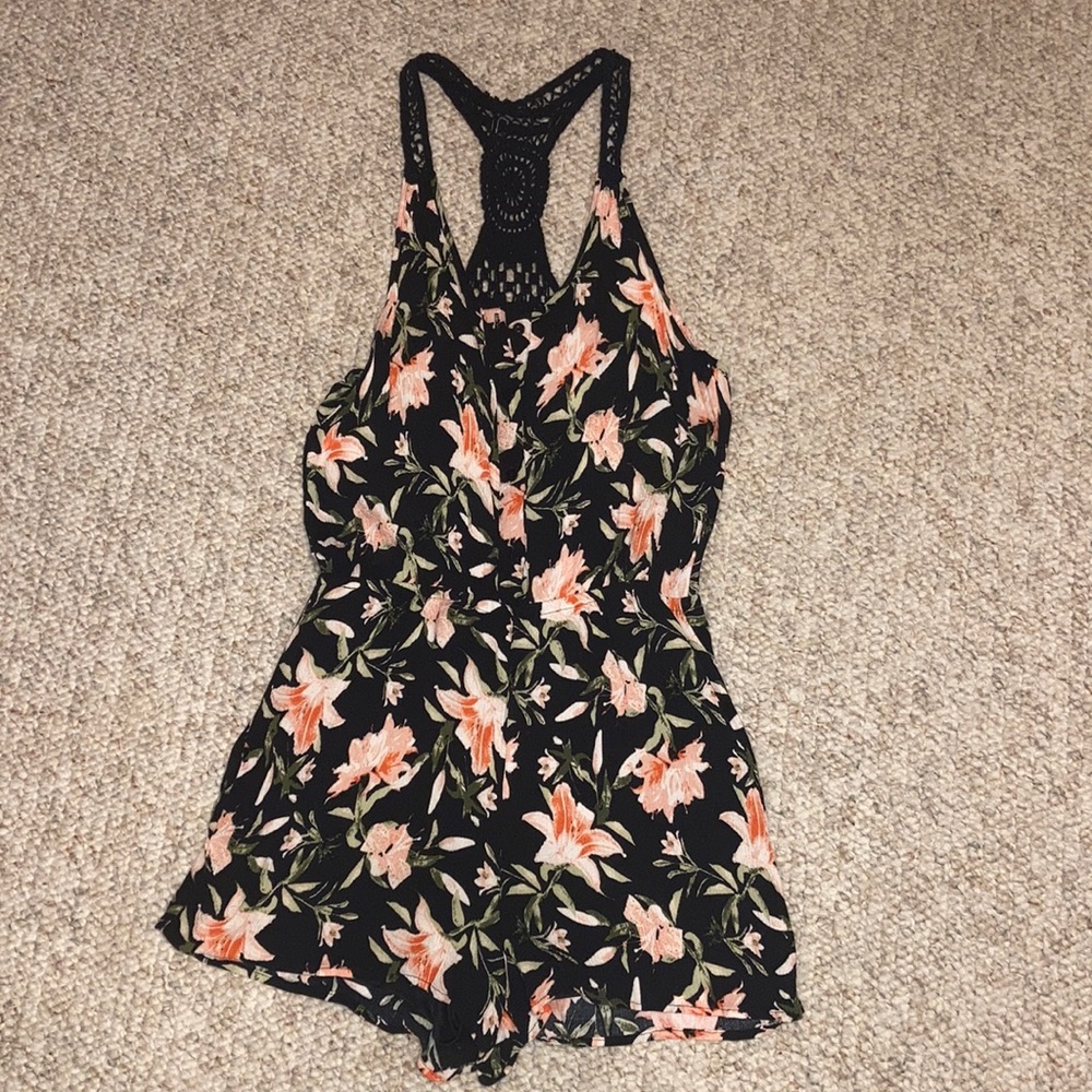 floral romper with lace detail on back